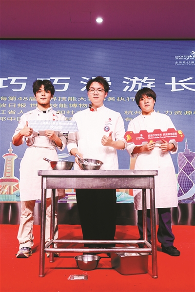 这些“冠军”告诉学生：“世界之巅”并不远
